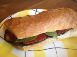 Grilled aubergine, red pepper and goats cheese baguette and Le Fruit Défendu rosé