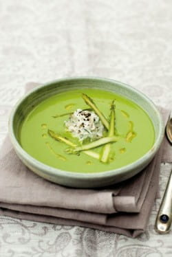 Asparagus soup topped with ricotta, chives and crispy chicken