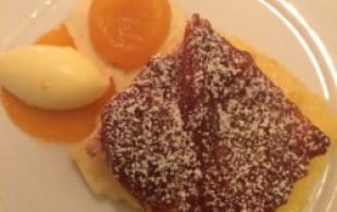 Bread and butter pudding with apricots and passito di Pantelleria