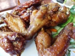 Vietnamese fish sauce chicken wings and tamarind whiskey sour