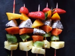 Fruit kebabs and Moët Ice Imperial 