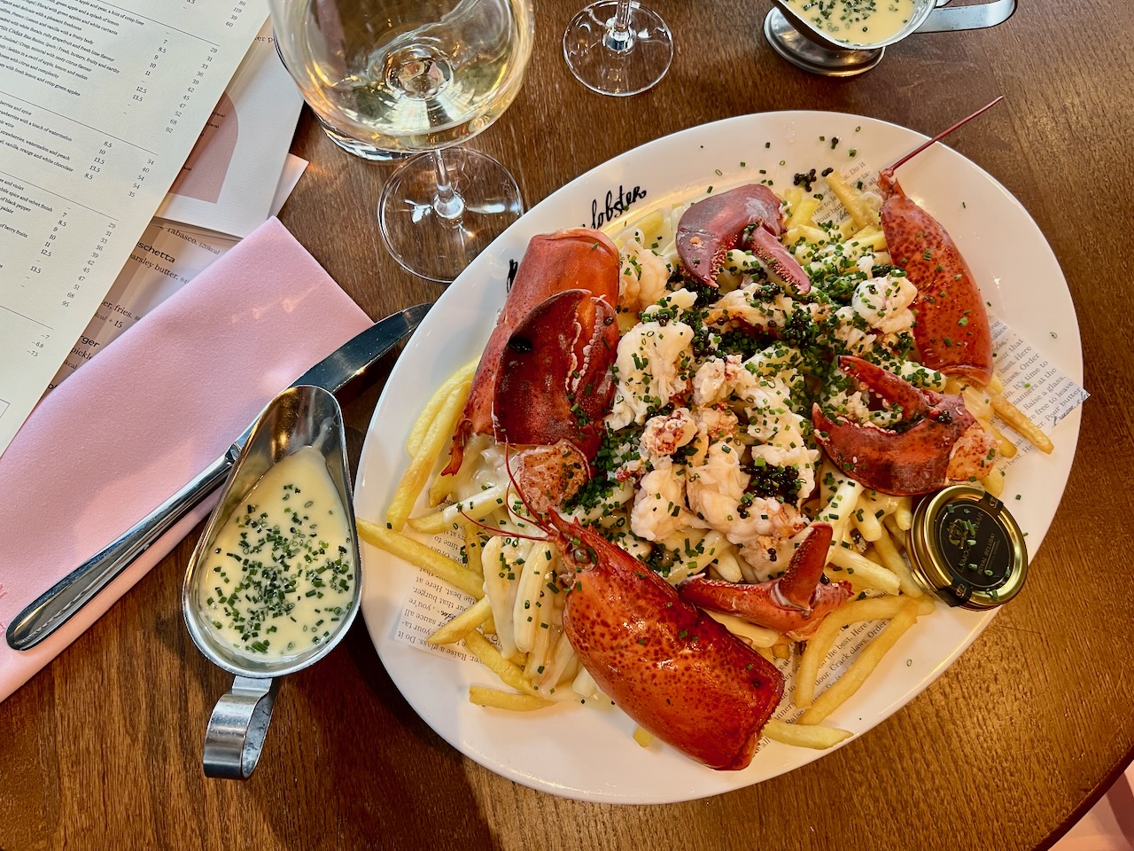 Lobster loaded fries and champagne
