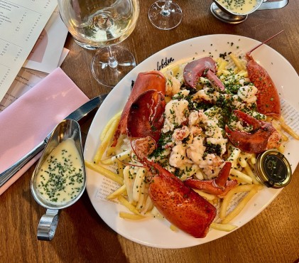 Lobster loaded fries and champagne