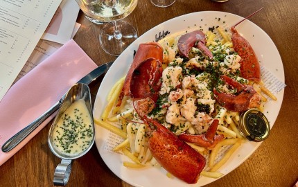 Lobster loaded fries and champagne
