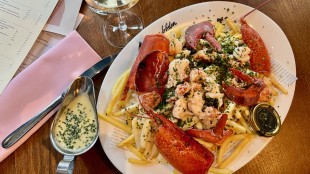 Lobster loaded fries and champagne