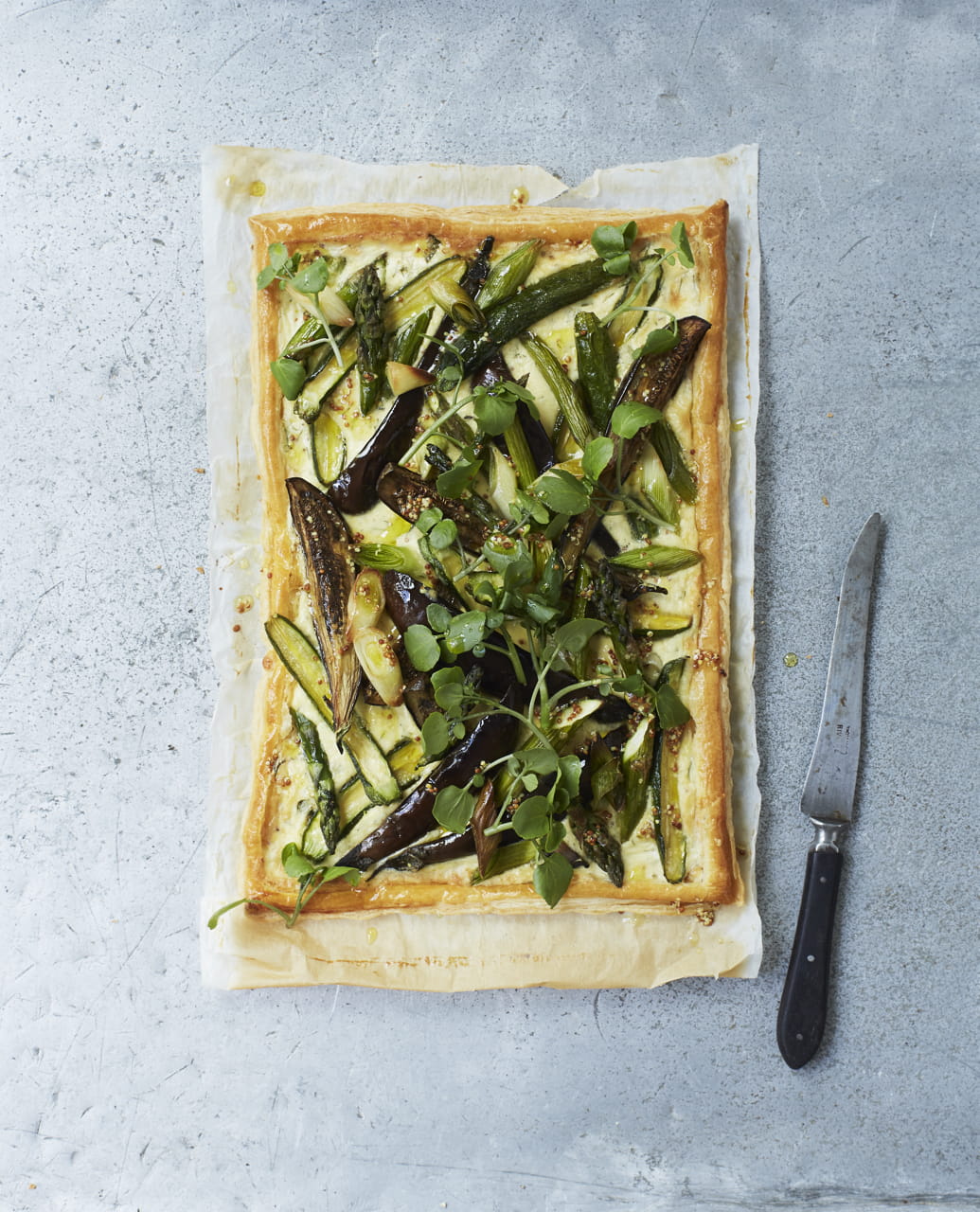 Spring vegetable tart with mustard cream and watercress