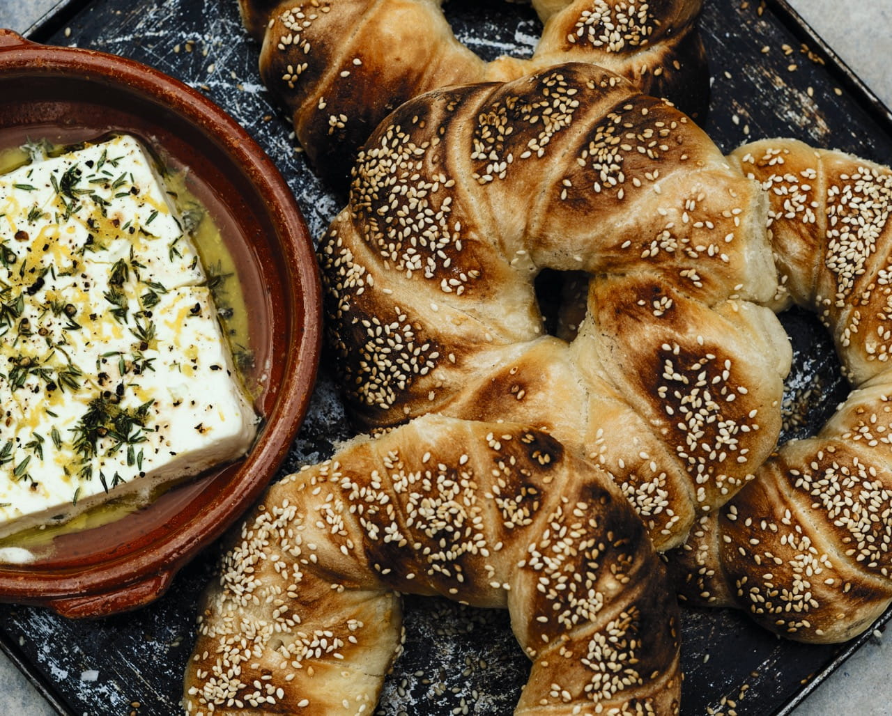 Simit with lemon and thyme-baked feta