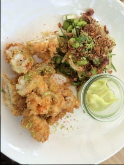 Crispy chilli lime squid with edamame bean and coriander salad and pinot gris