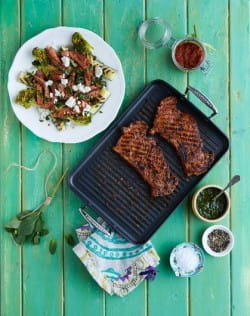 Rare seared sirloin steak slivers with feta, charred lettuce and charred cucumber
