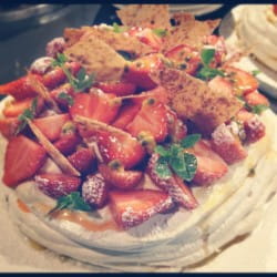 Pink peppercorn, passion fruit & strawberry pavlova