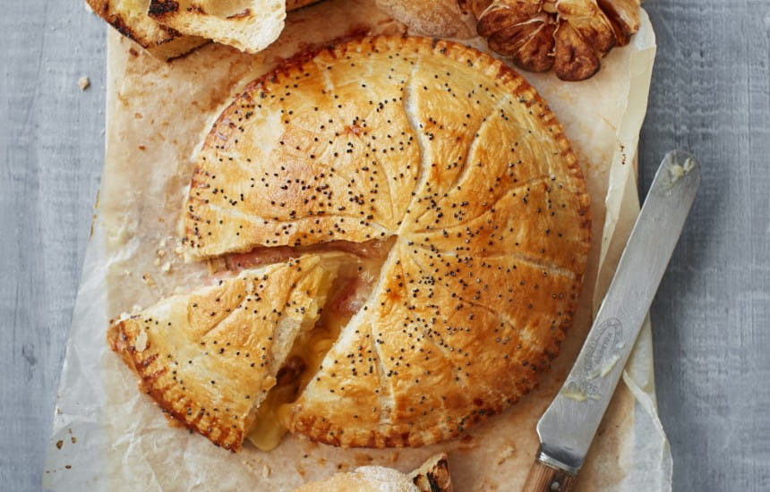 Puff pastry baked–Camembert  with quince and roasted garlic