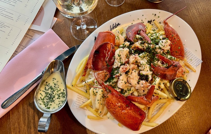 Lobster loaded fries and champagne