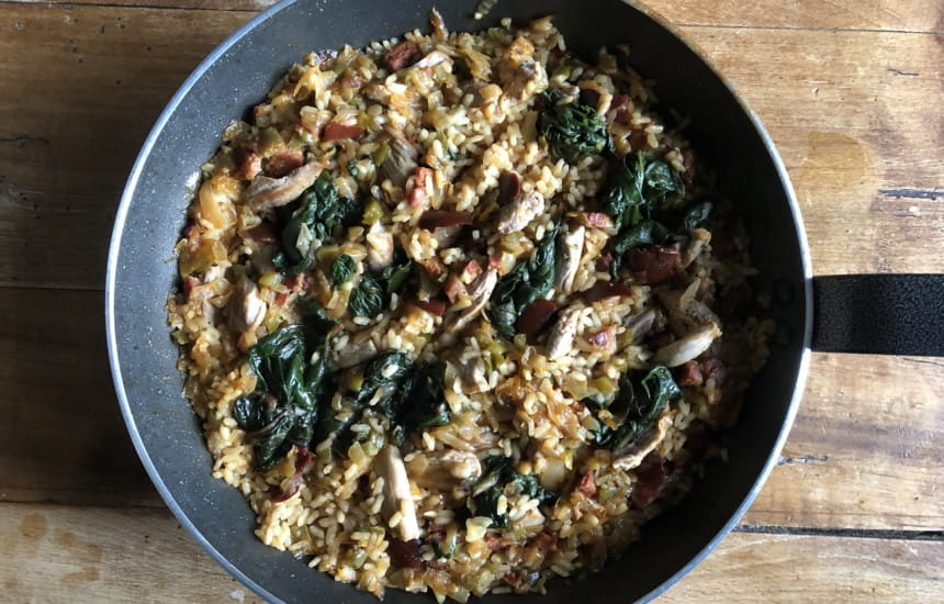 Paella with pork, chorizo and spinach and palo cortado sherry