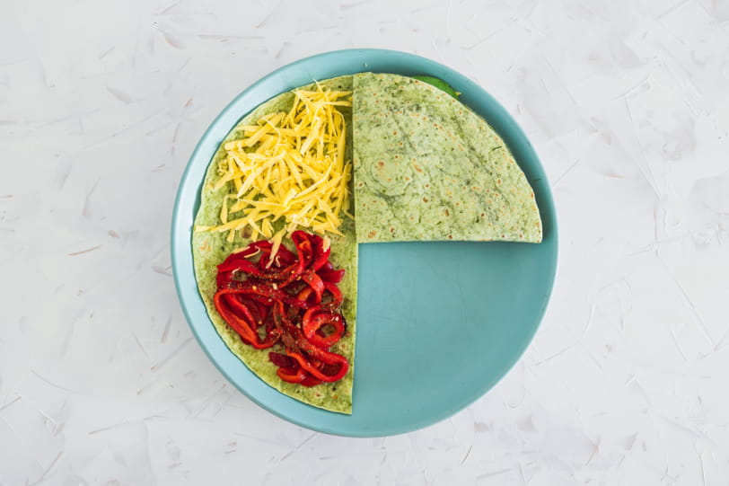 https://www.matchingfoodandwine.com/siteimages/Food-pix/layered-tortilla-wrap.jpg
